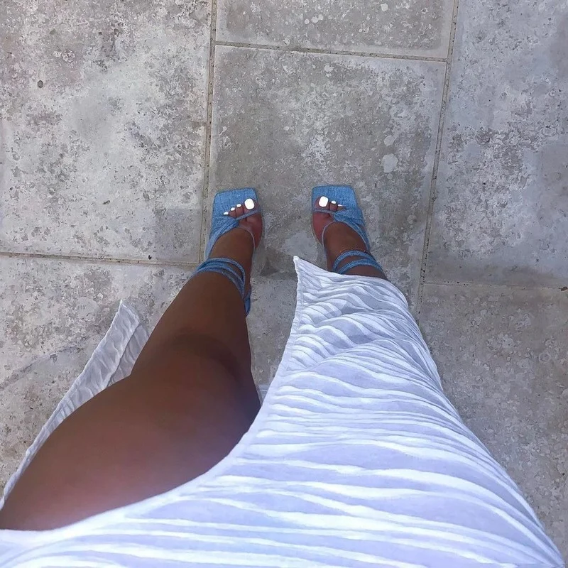 New Fashion cucitura europea e americana cava a forma di U gambe a fessura vita gonna irregolare dell'anca moda Street abbigliamento femminile