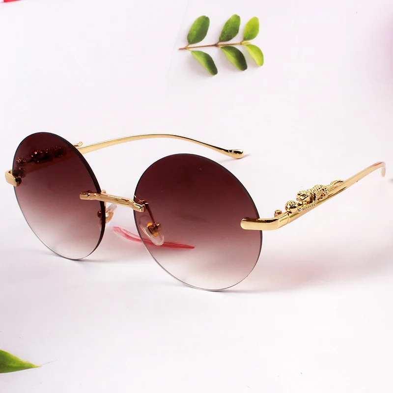 

Ladies Round Frame Exquisite Decorative Rimless Cut Edge Sunglasses Hipster Street Beat Concave Shape Sunglasses For Women