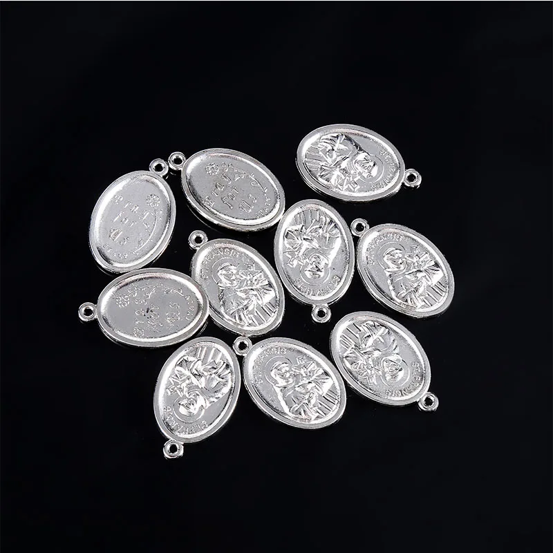 A variety of religious Christ small pendants, Lourdes small pendants, Saint Francis small pendants, Saint Michael small pendants