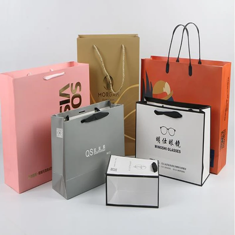 

100pcs Print logo Portable Clothes Paper Bags For Shopping Jewelry Paper Bags For Wedding Party Gift Bags