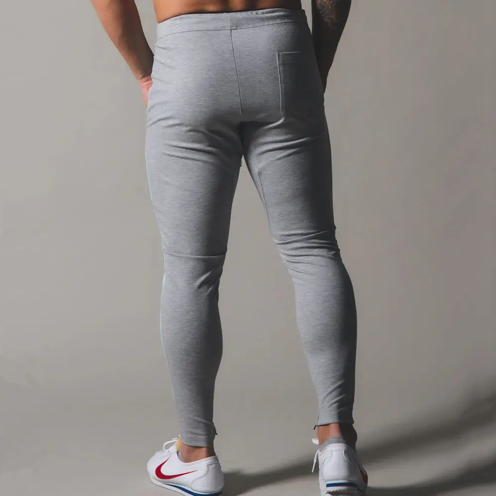 Pantaloni sportivi da corsa pantaloni da Jogging da uomo pantaloni da Bodybuilding in cotone pantaloni sportivi Skinny pantaloni da palestra Fitness abbigliamento sportivo da Jogging maschile