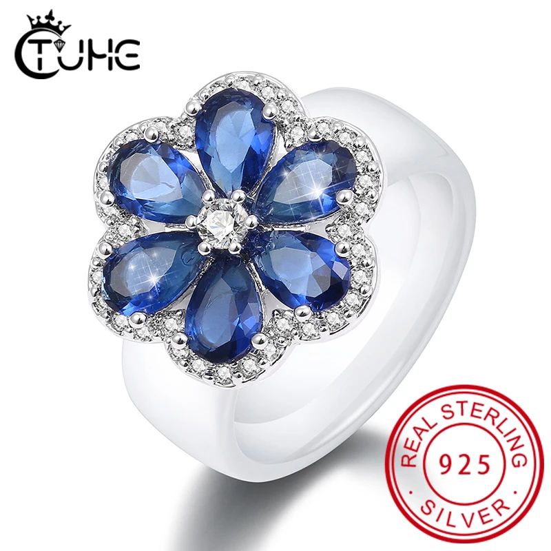 Trendy 925 Sterling Silver Flower Ring with Blue Crystal