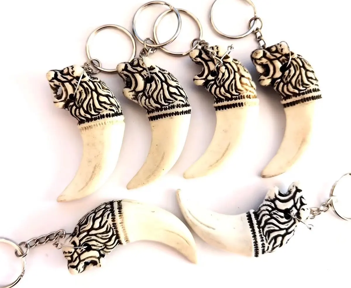 

12 pcs Fashion keychain retro amulet lion totem men's women's party jewelry hip hop holiday gifts wholesale