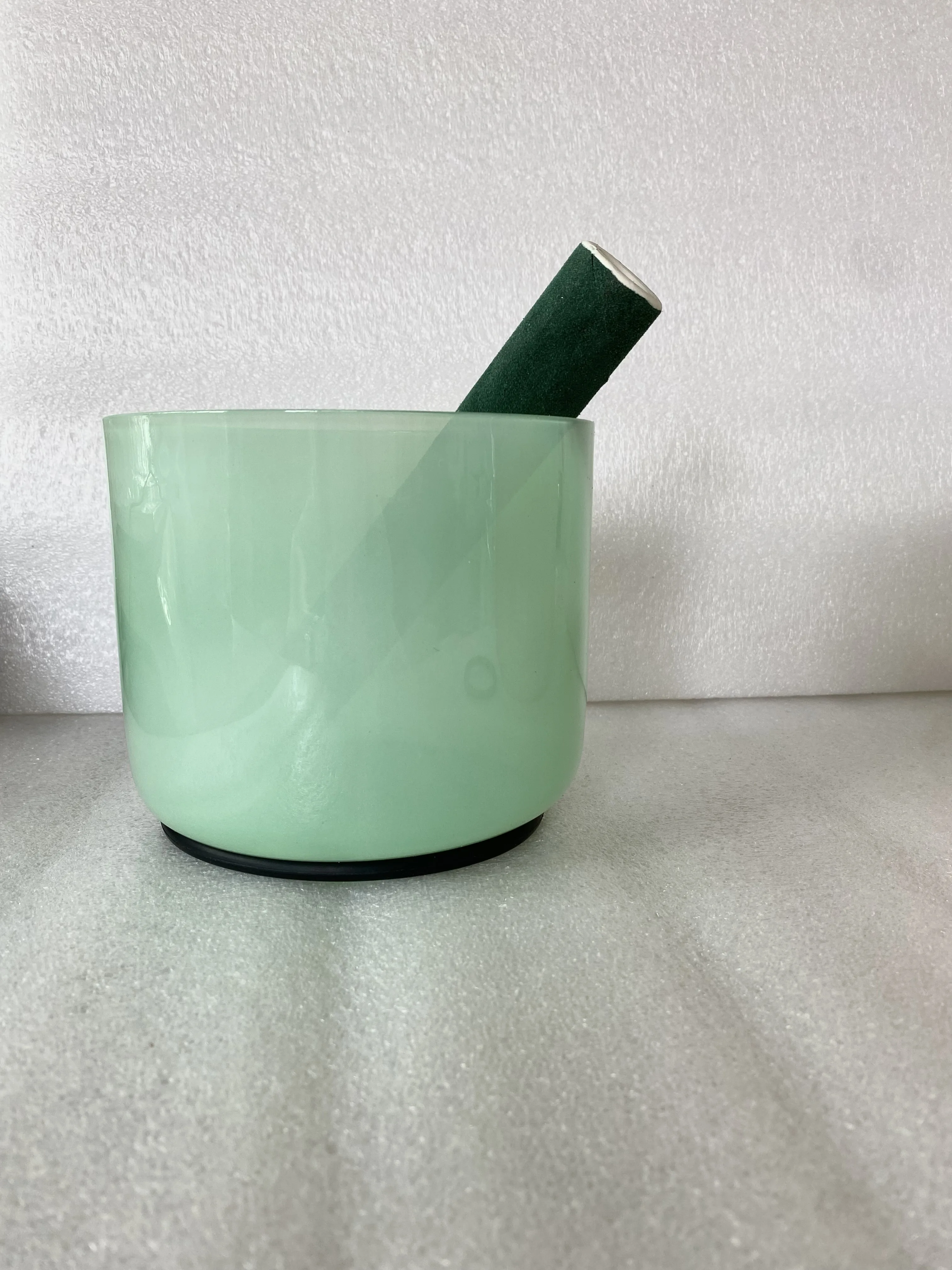 

Pastel green crystal singing bowl 7" for sound healing, straight wall flat bottom style. 432Hz