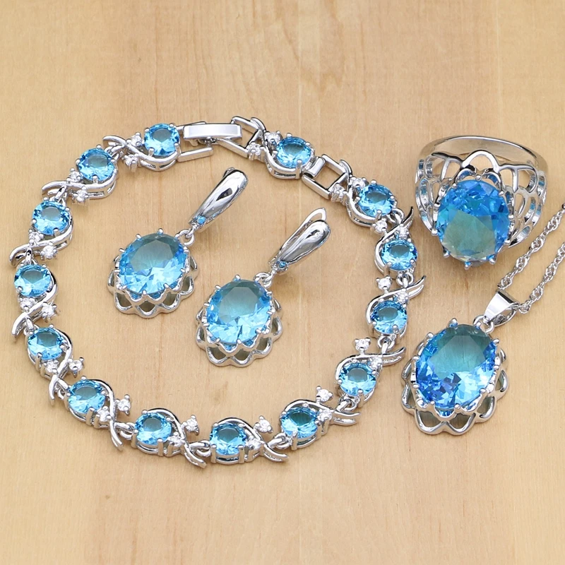 

Женский ювелирный комплект из кольца, серёг, кулона, браслета и ожерелья