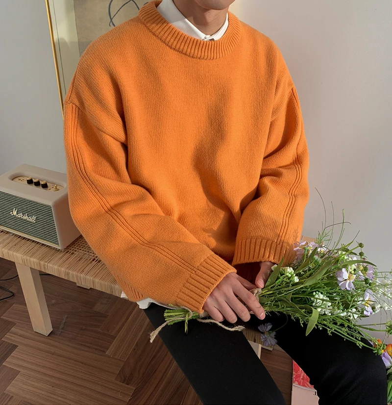 

Men's solid color round neck sweater autumn and winter trend Korean style knit sweater personality loose lazy wind jacket