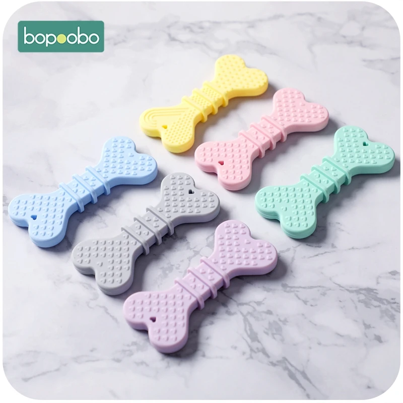 

Bopoobo 1PC Baby Teethers Silicone Dog Bones Chewable BPA Free Carton Toys Tiny Rod Food Grade Silicone Teether Baby Mobiles