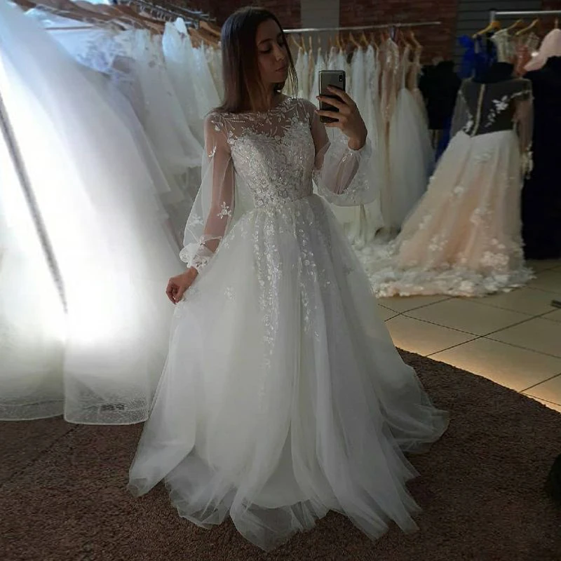 

Plus Size Long Sleeves Tulle Wedding Dresses 2022 Sheer Lace Applique O Neck Bridal Dress Beach Floor Length Wedding Dress