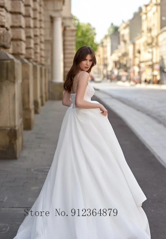 Sexy Spaghettibandjes Kant Applicaties Kralen Trouwjurk 2022 Netting Bruidsjurk V-hals Vloerlengte Backless vestido