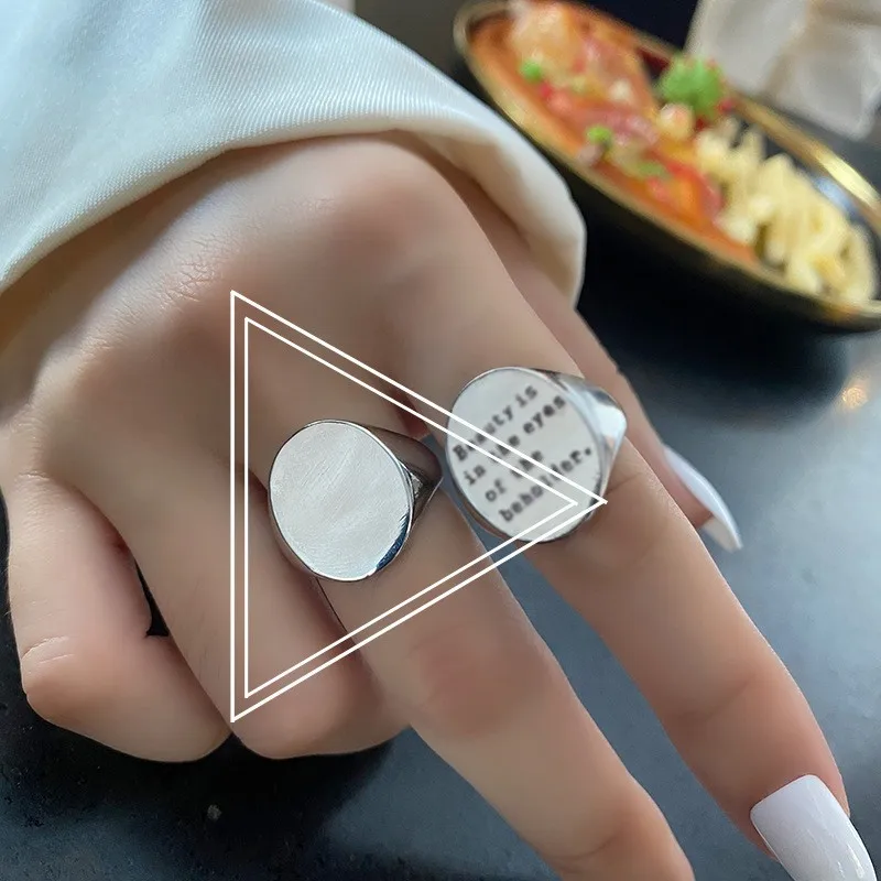 QMCOCO Korean Silver Color Ring Woman Simple Personality Wide Oval Smooth English Letter Student Exquisite Index Finger Ring