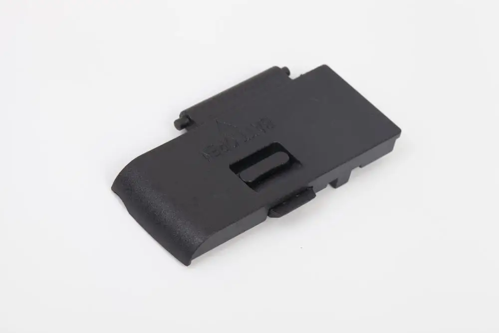 Nueva tapa de la puerta de la Cámara de la batería para Canon 650D, pieza de reparación de la Cámara T3i