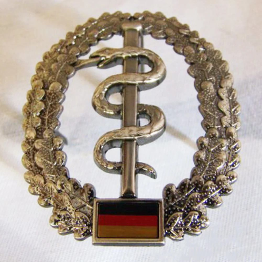 

GERMAN MEDICAL TREATMENT BERET CAP BADGE PIN SNAKE METAL COCKADE