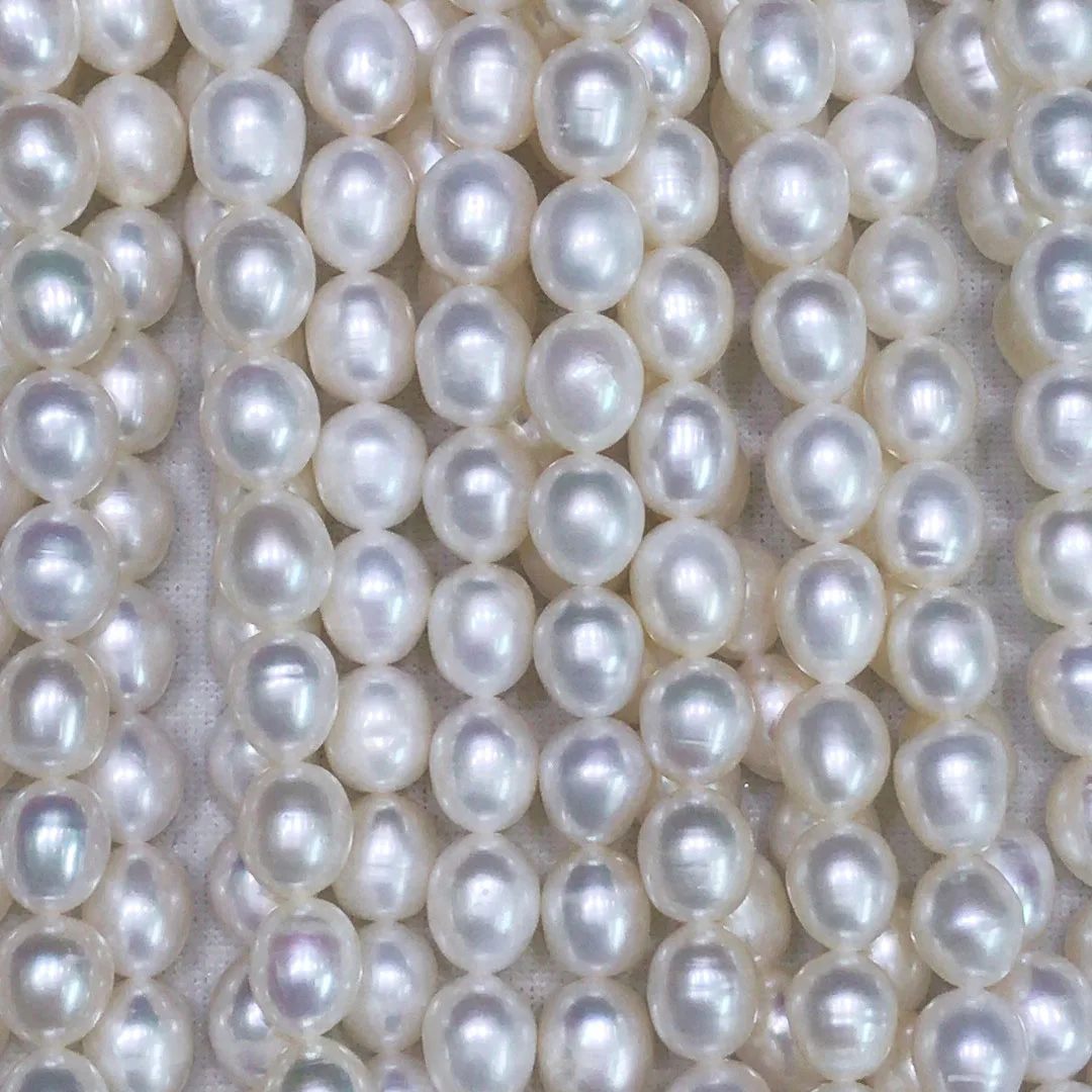 

free shipping,16 inch AAA high luster 9-10 mm rice pearl ,100% nature freshwater pearl material ,without nuclear