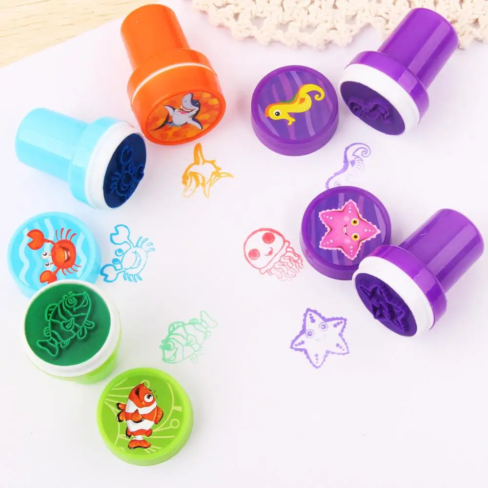 10 pièces/ensemble mignon timbre jouet dessin animé dinosaure Animal vie Marine encourager motif rond en plastique bricolage jouet joint avec boîte pour les enfants