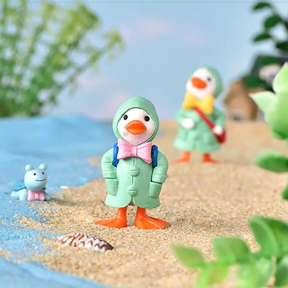 4 sztuk/zestaw parasol płaszcz przeciwdeszczowy Cute Cartoon kaczka miniaturowa figurka ozdoby żółte kaczki figurka dla miniaturowy wystrój ogrodu