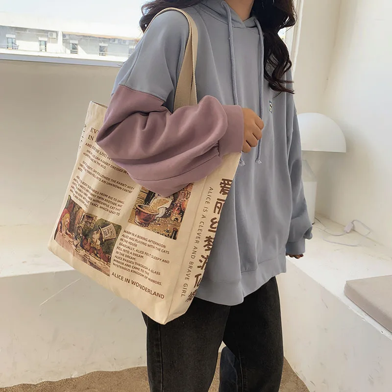تصميم جديد المرأة حقيبة كتف قماش أليس في بلاد العجائب أكياس التسوق الطلاب حقيبة كتب القطن القماش حقائب اليد حمل للفتيات