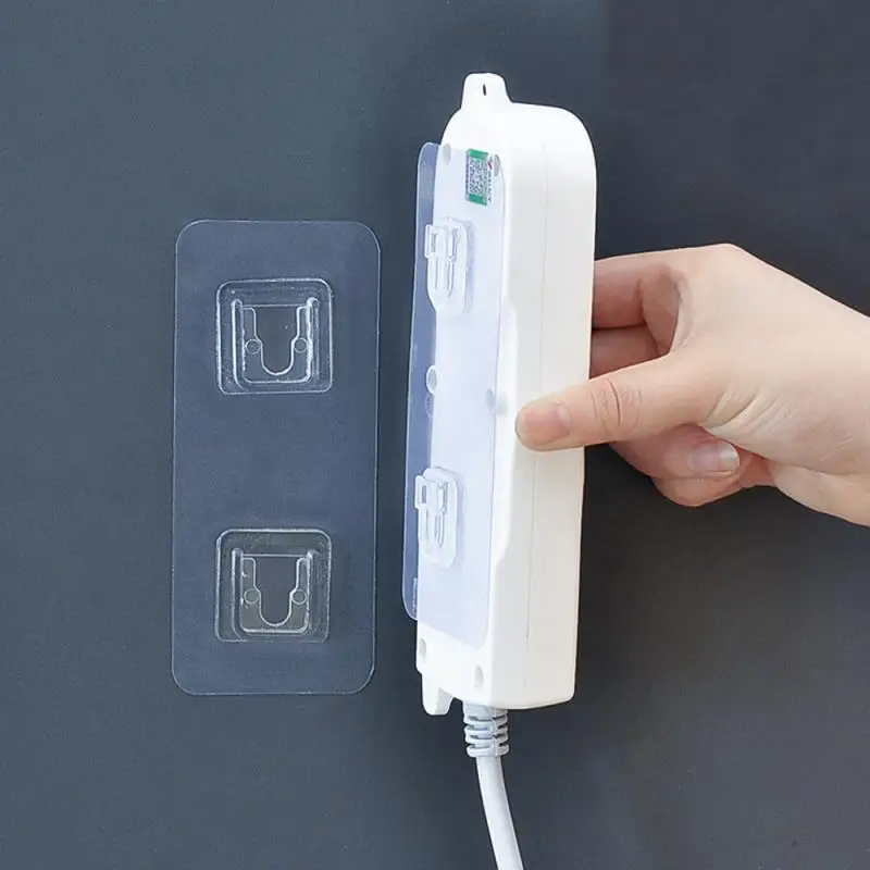 

Wall-Mounted Plug Fixer Sticker Punch-free Home Self-Adhesive Socket Fixer Rack Cable Wire Organizer Seamless Power Strip Holder