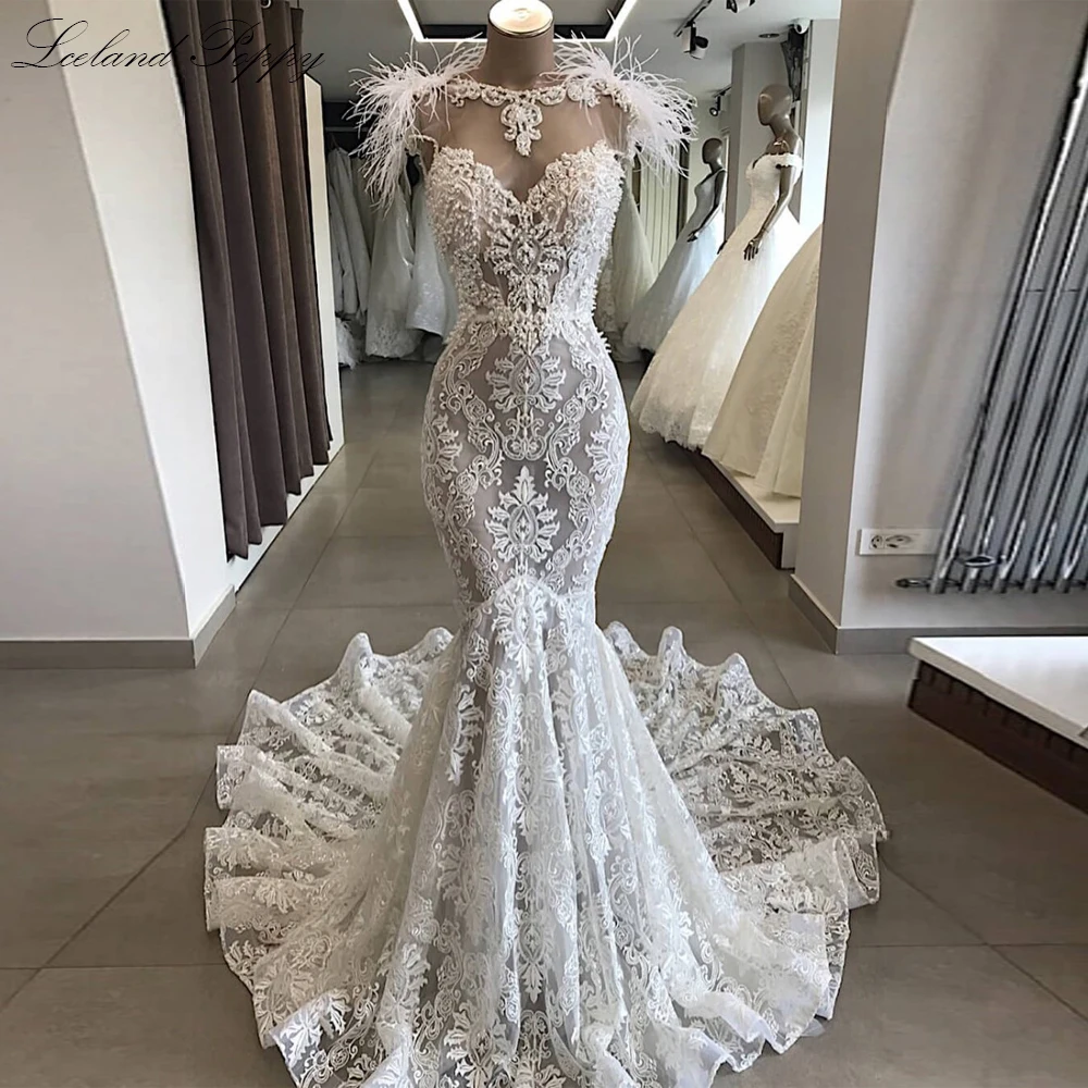 Lceland Poppy Customized Lace Mermaid Wedding Dresses Sleeveless Pearls Beaded Floor Length Backless Bridal Gown with Feathers