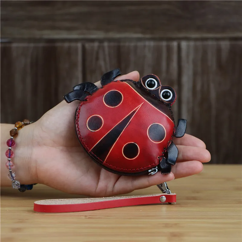 Il primo strato di pelle bovina creativo sette stelle coccinella borsa portamonete cambio chiave moneta semplice cartone animato borsa a mano