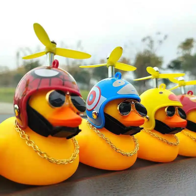 

Car cute little yellow duck with helmet propeller windbreaking wave duck car interior home decoration without lights