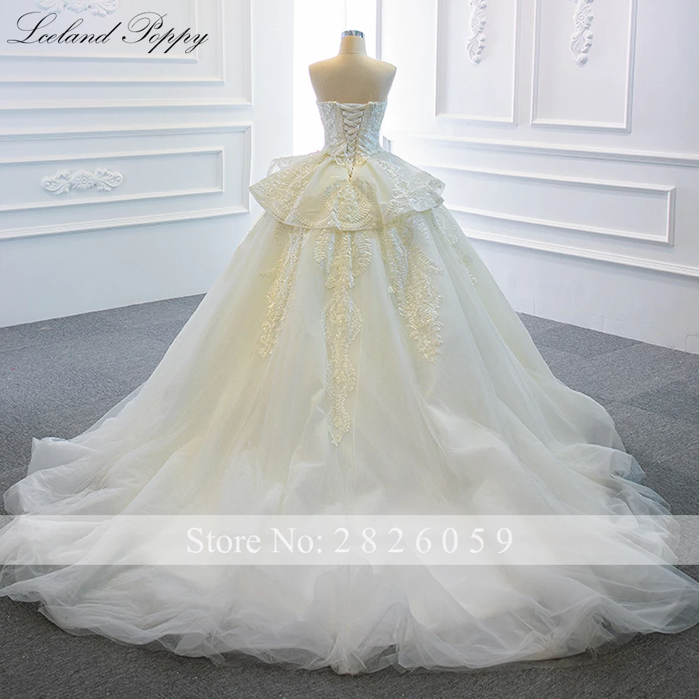 IJsland Poppy op maat gemaakte strapless baljurk kanten trouwjurken mouwloze kralen vloerlengte gelaagde bruidsjurken