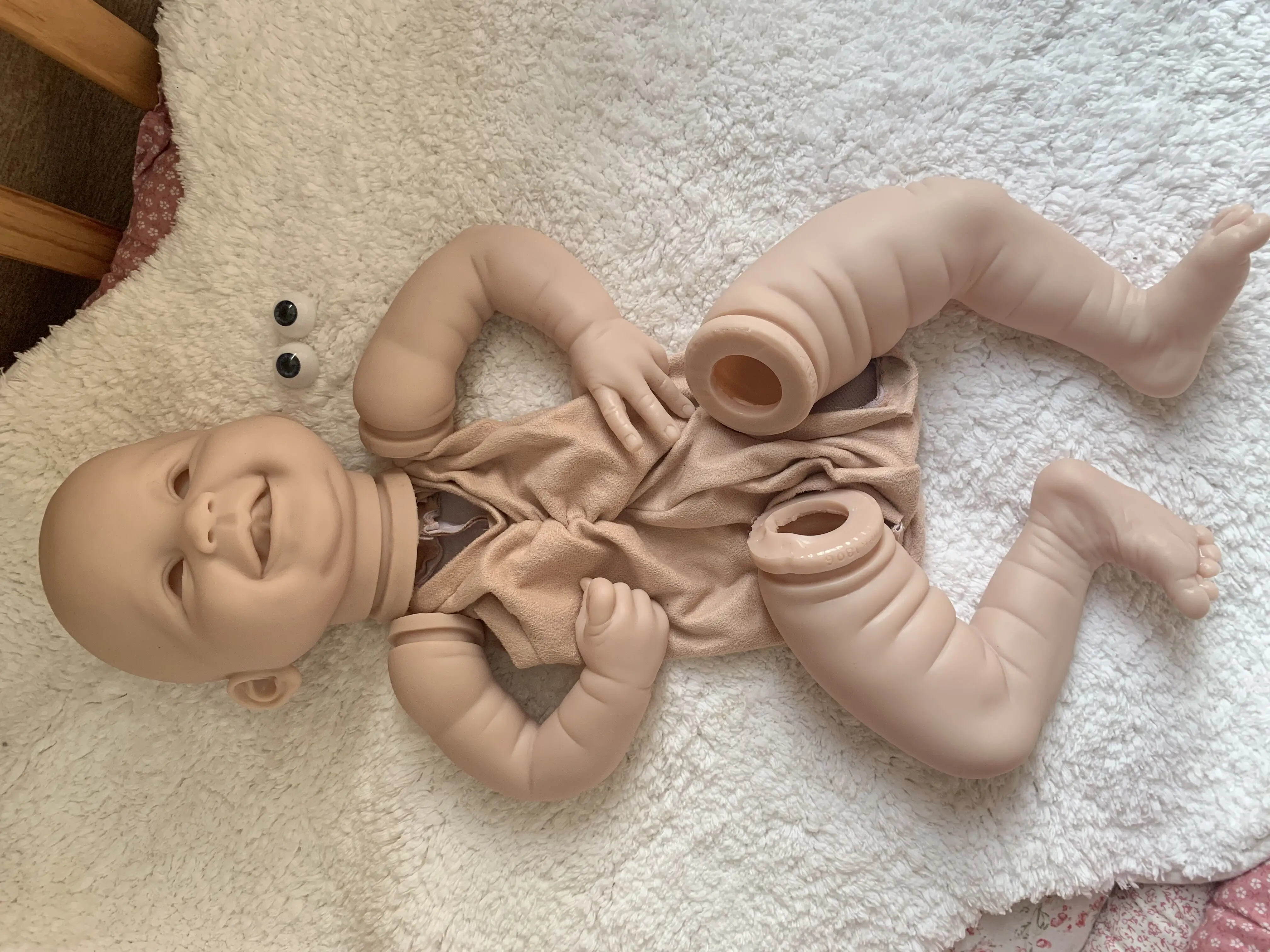 NPK 22 Inch DIY Reborn Doll Kit Smiling Face Juliana by Ping Luo Soft Touch Unpainted Unfinished Doll Parts for Collectors