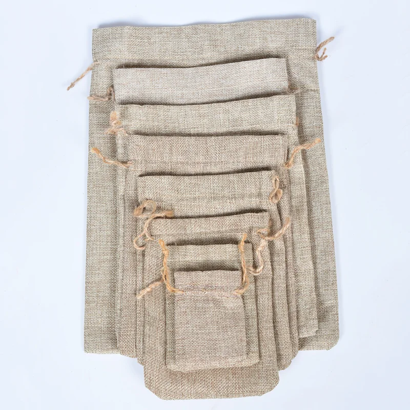 50pcs/lot Natural Burlap Linen Jute Drawstring Gift Bags Party Favors Packaging Bag Wedding Candy Gift Bags Party Supplies