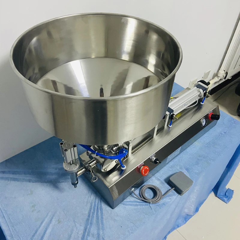 Pequeña máquina neumática de llenado de pasta de un solo cabezal, máquina de llenado eléctrica de productos para el cuidado de la piel, salsa de pasta de propóleo