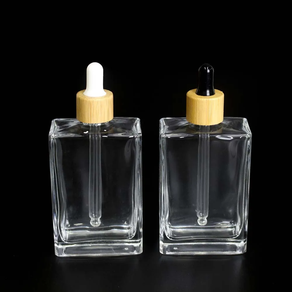 Spot Wholesale 100ml Square GlassTransparent Dropper Bottle Cosmetic Bamboo Cover Essential oil bottle container