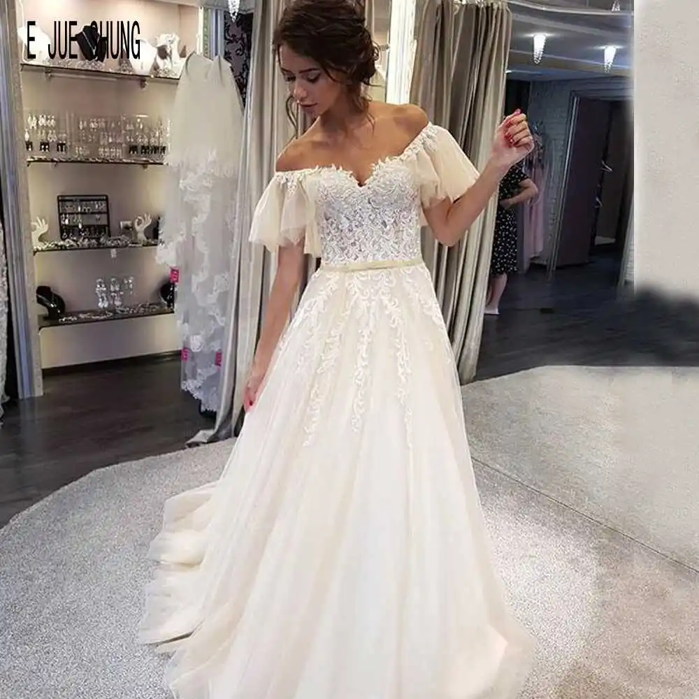 E JUE SHUNG nowy elegancki tiulowa suknia ślubna Off the Shoulder z krótkim rękawem koronkowe aplikacje vestidos de novia Boho ślubne sukienki