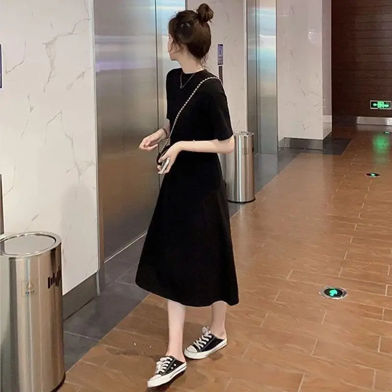 

Short sleeve dress women's mid long 2021 summer Korean loose and thin over the knee small black skirt student skirt