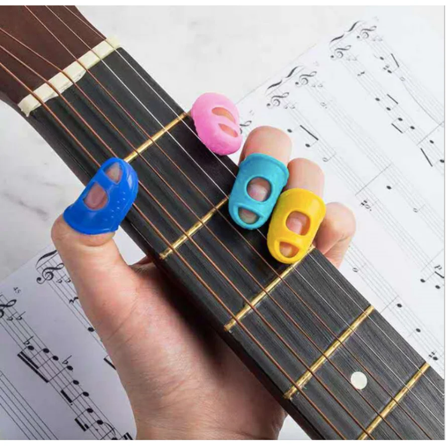 New 4Pcs Silicone Finger Guards Guitar Fingertip Protectors For Ukulele Guitar Non-Slip Finger Sets 6 Color Optional