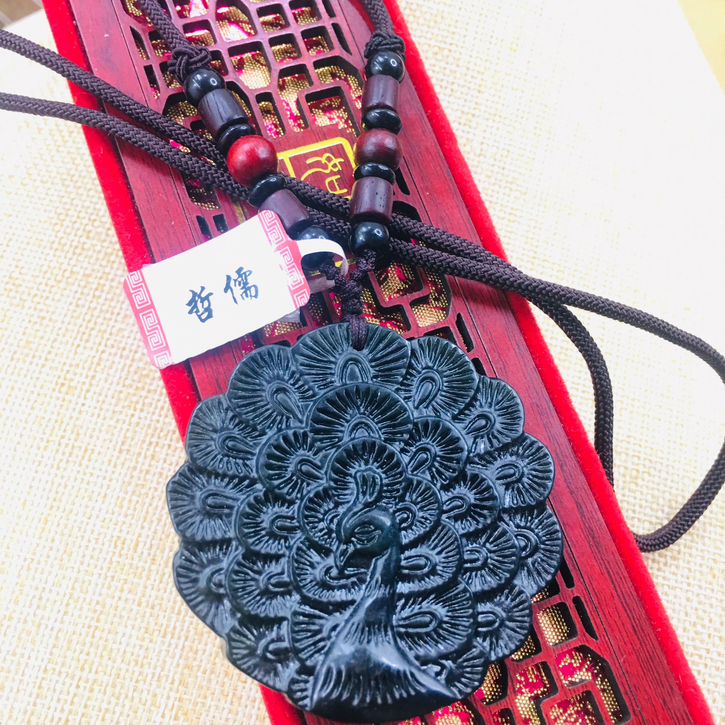 

Natural Hetian Black Jade Hand-carved Black Double-sided Peacock Pendant Necklace Sweater Chain Send Certificate