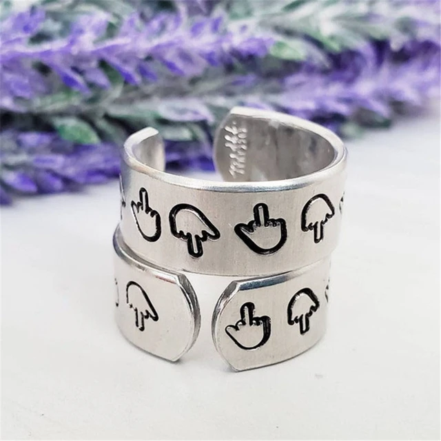 Silver ring on middle finger clearance