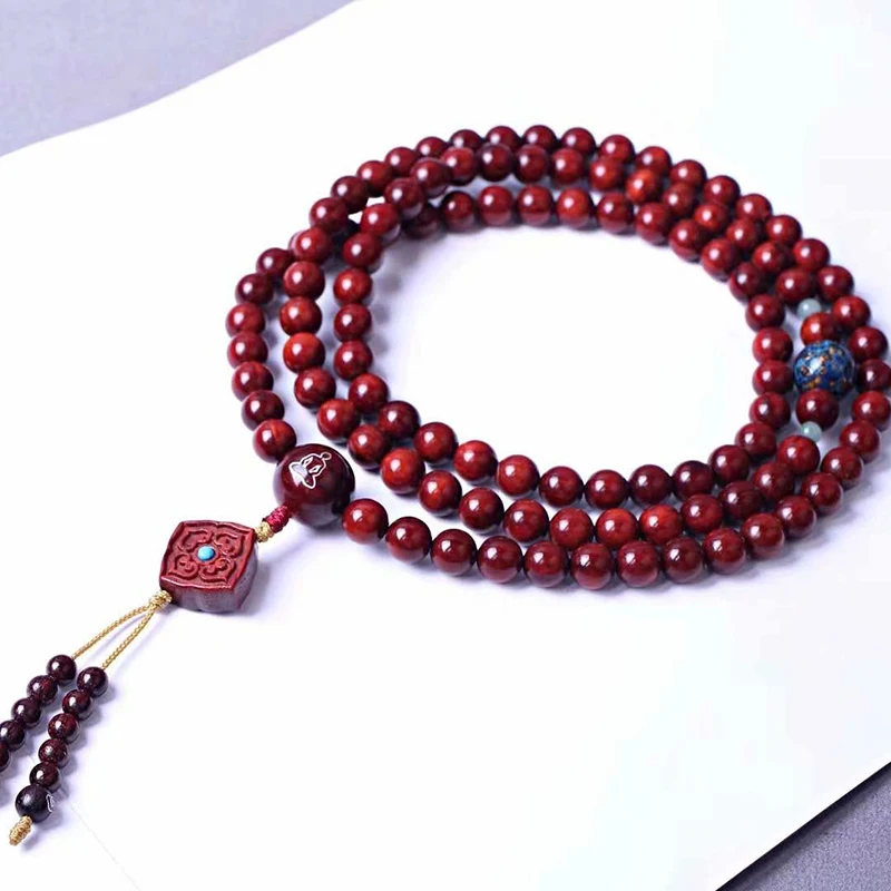 

Fidelity lobular rosewood bracelet rosary bracelet 0.8*108 thousand-year-old chicken red glass beads.