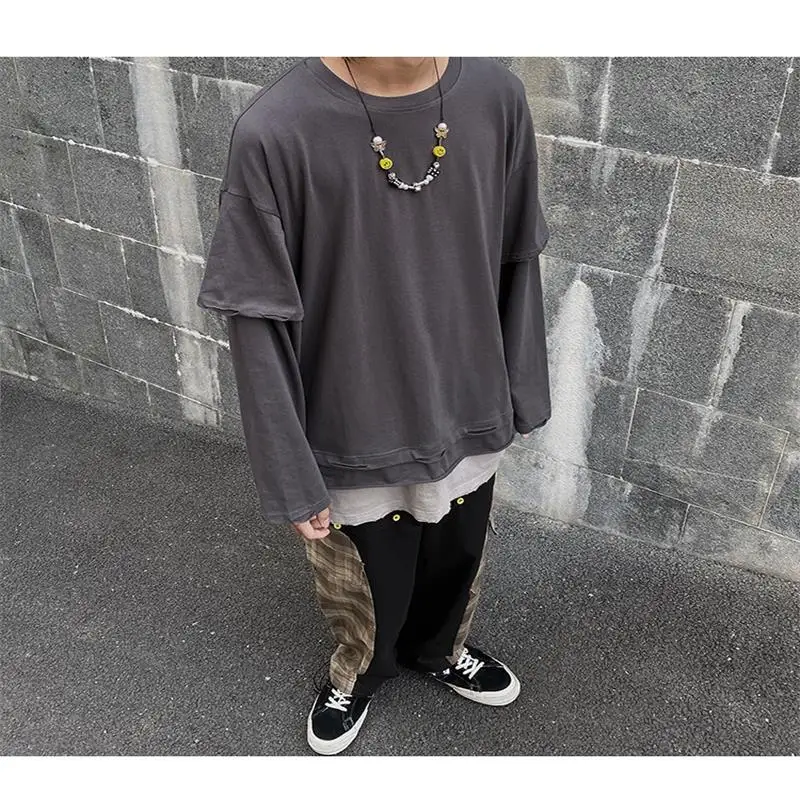 Men's new personality false two splicing hip-hop solid color all-match long sleeves bottom shirt loose large size T-shirt