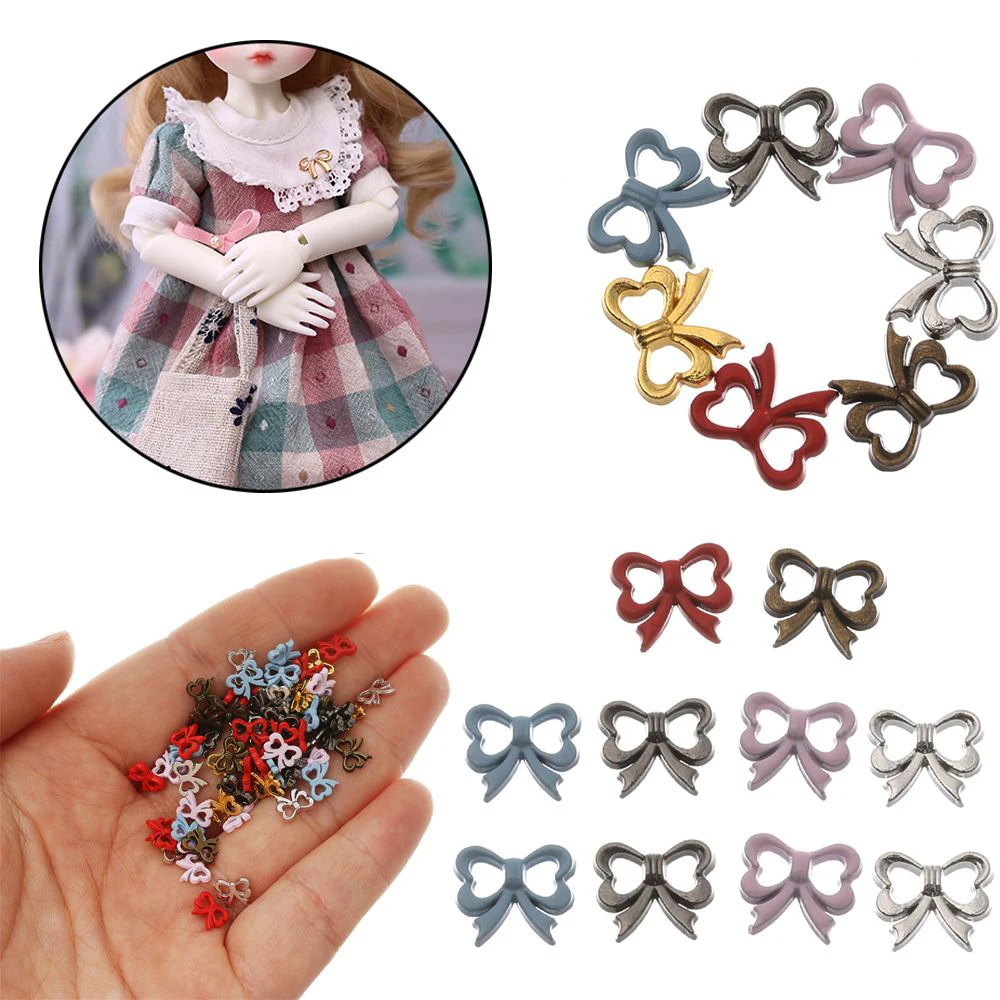 20 sztuk kolorowe Mini guziki 5/7mm metalowe lalki klamry słodkie Bownot kształt lalki przycisk DIY do lalek ubrania klamra torba do szycia Accessorie