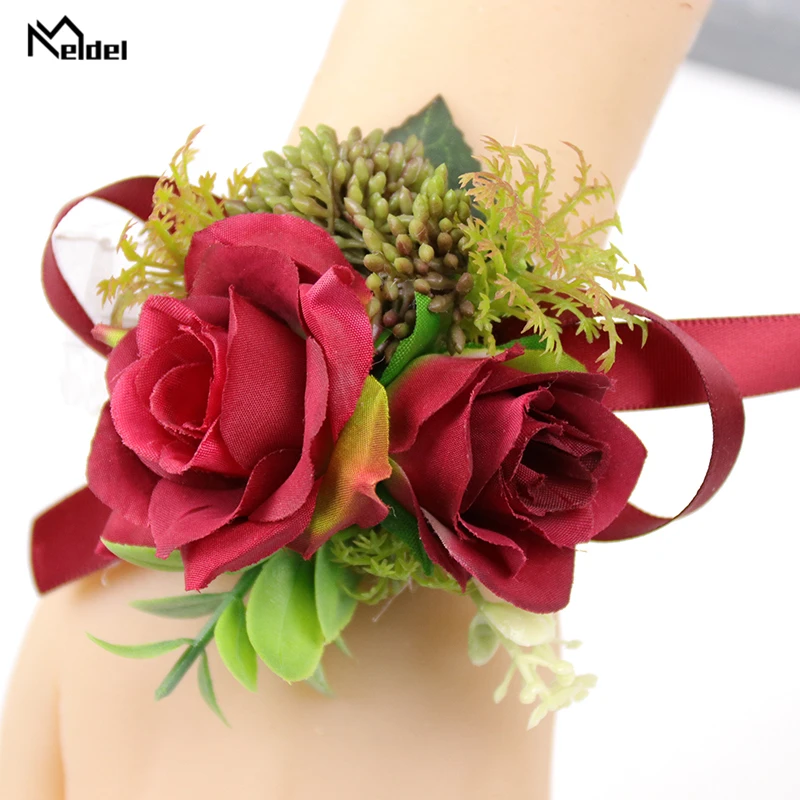 Meldel สีแดง Boutonniere งานแต่งงาน Bridesmaid สายรัดข้อมือผ้าไหมคุณภาพสูง Rose ดอกไม้ Corsages พรหมประดิษฐ์ดอกไม้สีแดง