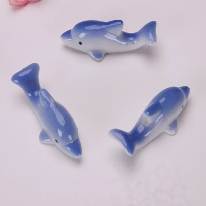 

100pcs ceramic Blue dolphins Chopstick Holder Set Support Fork Coffee Spoon Creative Dinnerware Stand Kithchen Tools