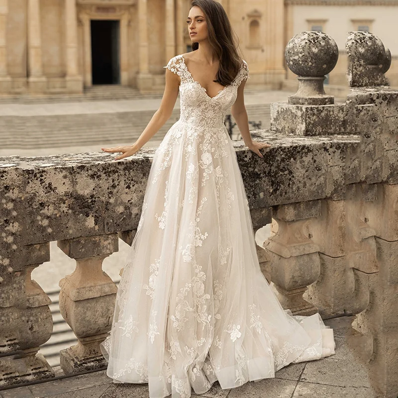 Abiti da sposa Vintage Boho una linea scollo A V manica manica pizzo abito da sposa Backless estate spiaggia abiti da sposa Robe de Mariee