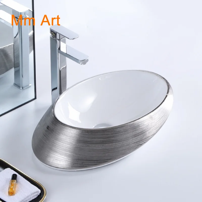 

Fashion attractive design plated silver color ceramic above counter top art hand wash basin vessel bathroom sink Bathroom sink