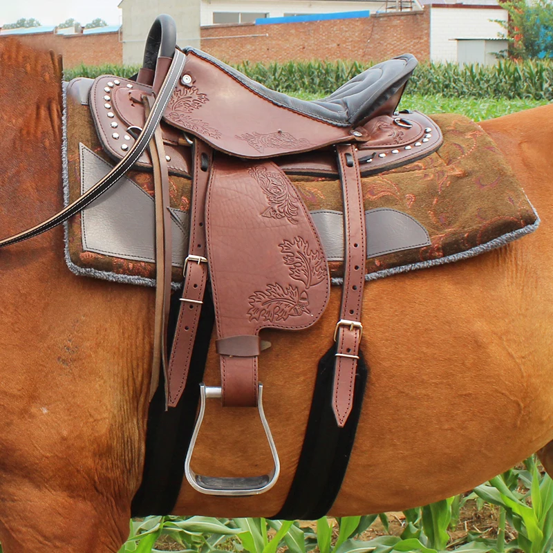 

A full set of saddles, cowhide carved endurance saddles, large and small saddles with a full set of equestrian supplies