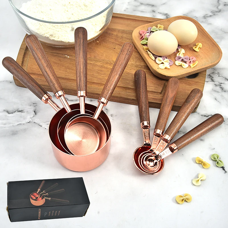 

Rose Gold 4pcs Copper Stainless Steel Measuring Cups and Spoons with Wood Handle for Liquid and Dry Ingredients Measuring Cups