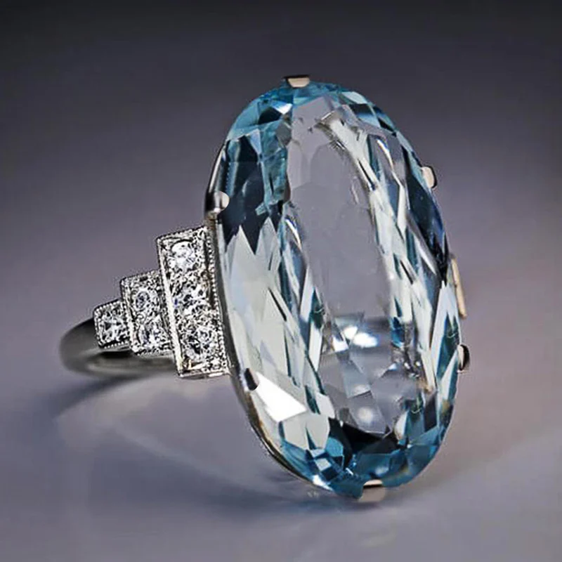 Huitan Kobieca jasnoniebieska obrączka ślubna Solitaire Band Oval Stone Engage Party Kobiety Luksusowa biżuteria Shine CZ Stone Najlepszy prezent
