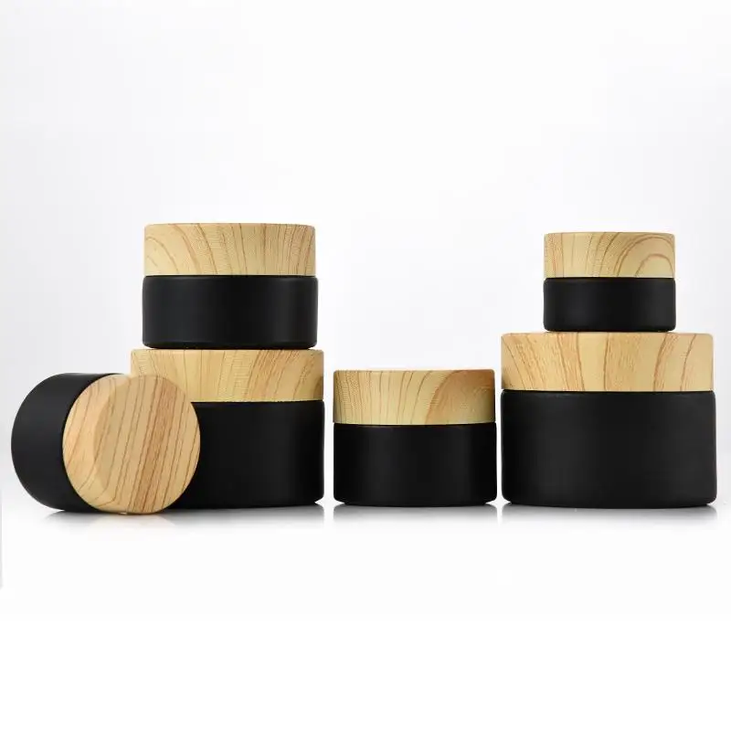 

Black Frosted Glass Jars Cosmetic Jars with Woodgrain Plastic Lids PP Liner 5g 10g 15g 20g 30 50g Lip Balm Cream Containers