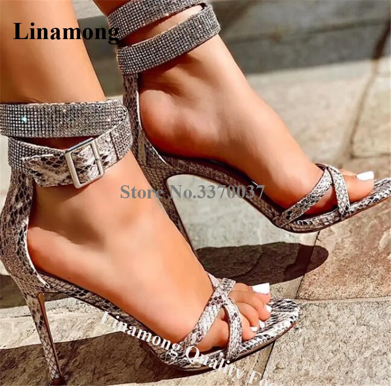 

Linamong New Shining Rhinestone Ankle Strap Stiletto Heel Gladiator Sandals Snake Leather Crystal High Heel Sandals Dress Heels