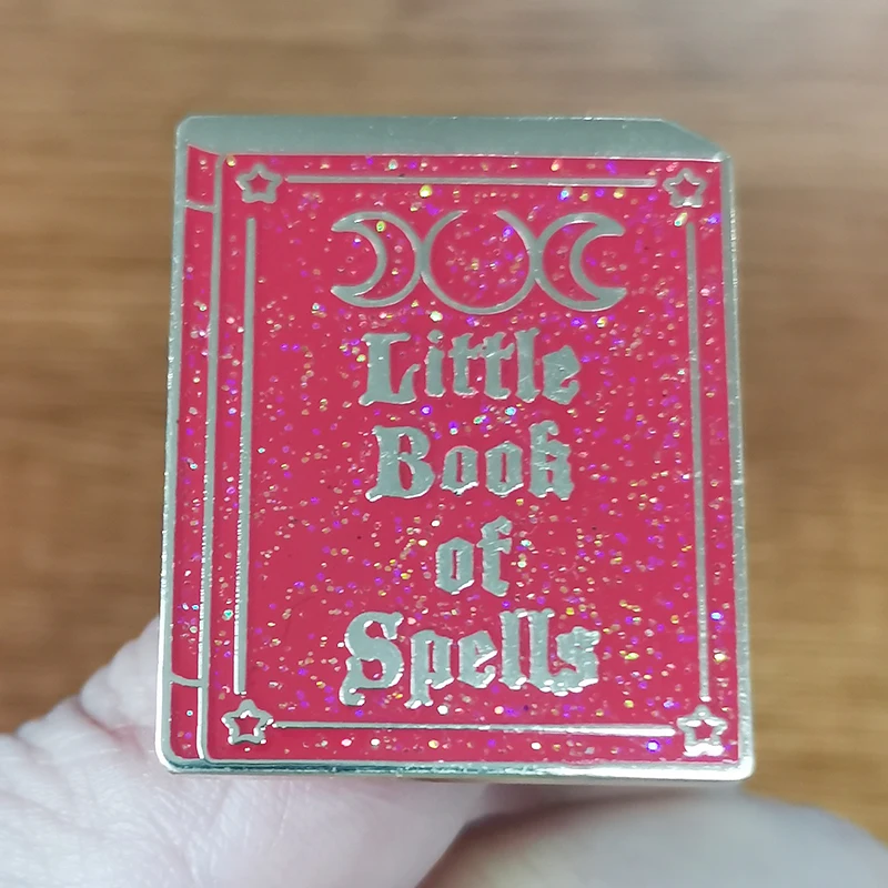 Spell book brooch