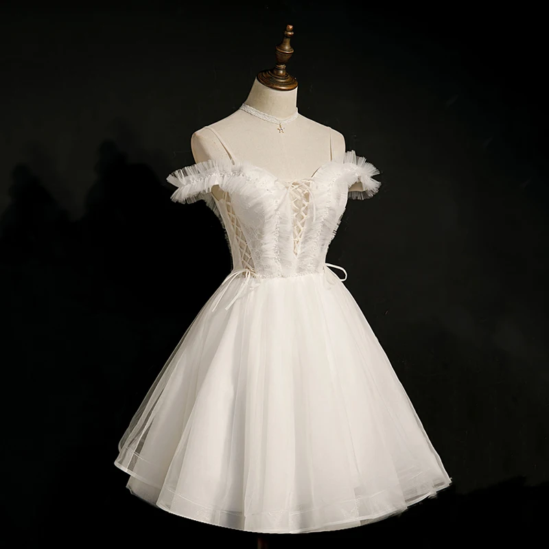 AnXin SH princesa encaje blanco correa de espagueti volantes lazo de cristal con cordones vestido de noche corto personalizado pequeño vestido blanco