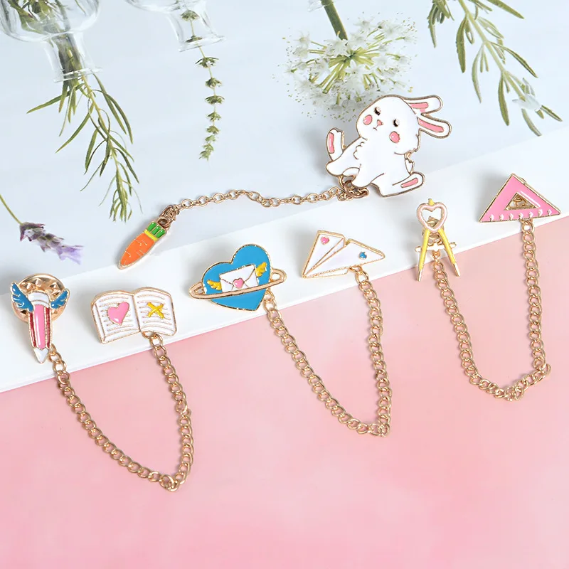 XEDZ موضة منطاد الحيوانات الطائر رافعة اثنين البتلة سلسلة المينا بروش العظام النخيل زهرة المعكرونة أرنب رائد الفضاء شارة مجوهرات fr