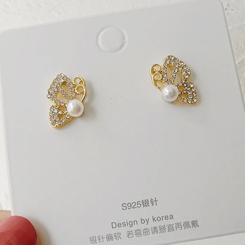 2021South Korea's New Rhinestone Pearl Half Butterfly earrings Hollow   Simple And Generous Butterfly Earrings Women's Jewelry